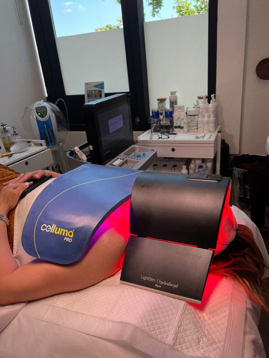 Client receiving LED light therapy during a customized facial at Bare Skin & Wax in Woodland Hills