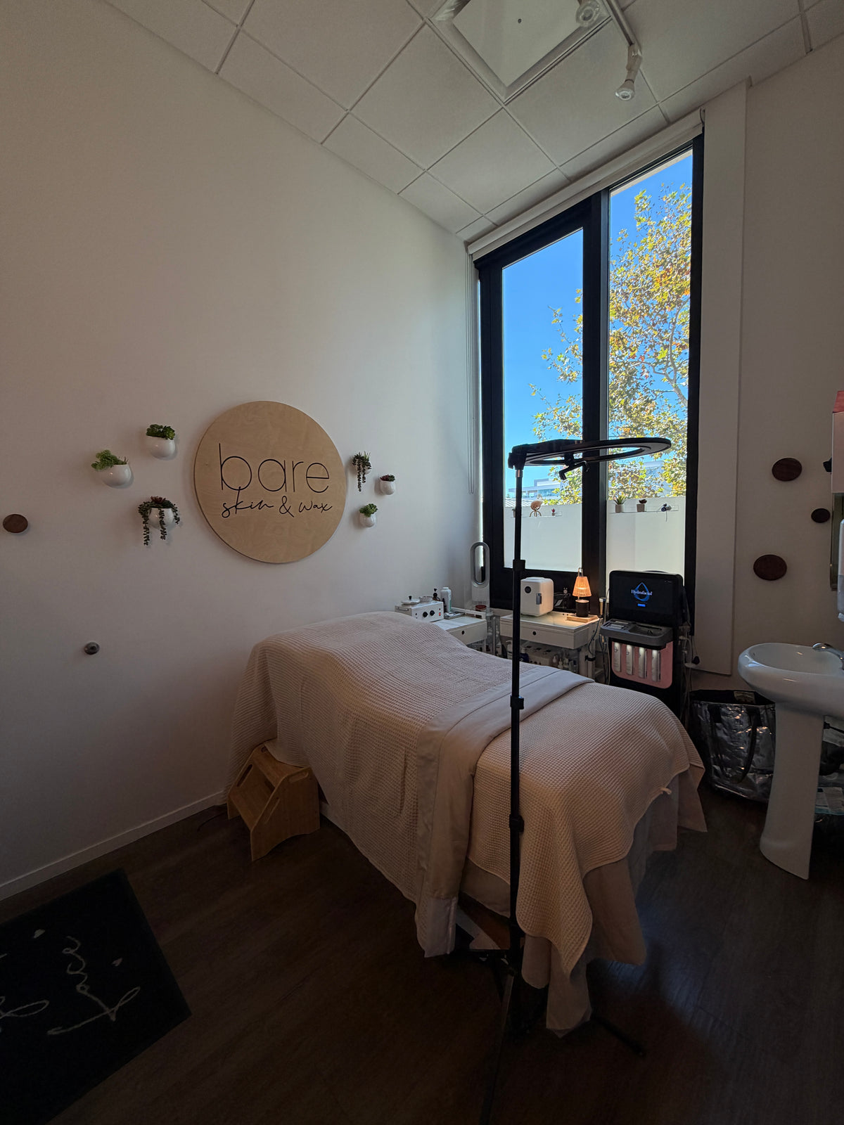 Bare Skin & Wax treatment room with Hydrafacial machine in Topanga Village, Woodland Hills